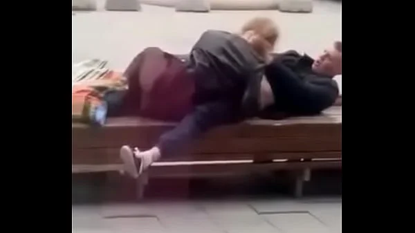 Stupid blonde gives blowjob in public
