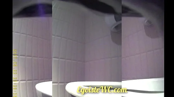 The camera in the women's toilet filmed the beautiful vaginas of girls close-up