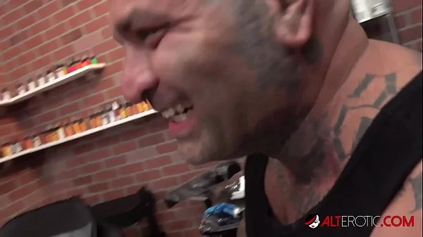 Tiger Lilly gets a forehead tattoo while nude