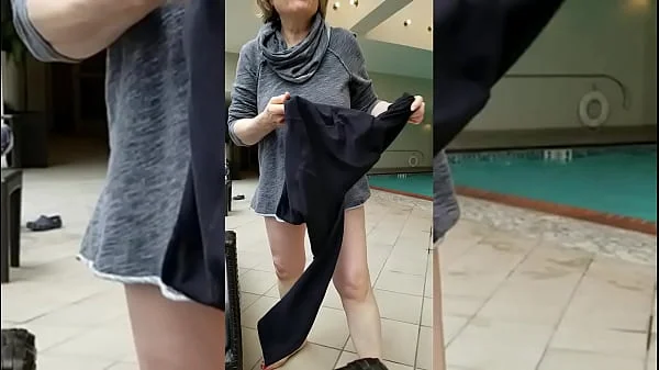Sexy Grandma is Sexy at 66 in a black swimsuit